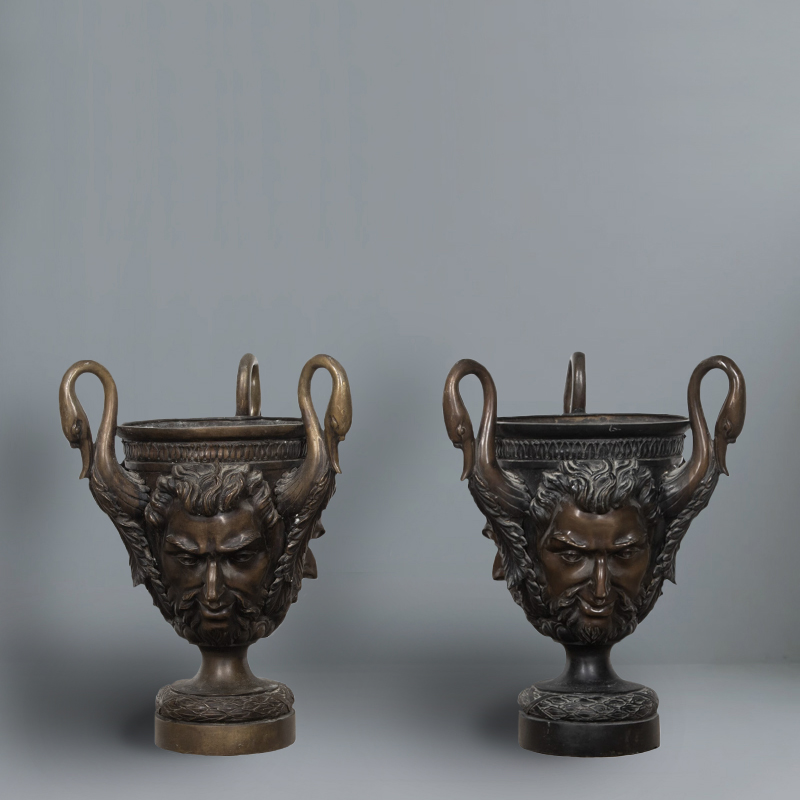 pair of bronze urns